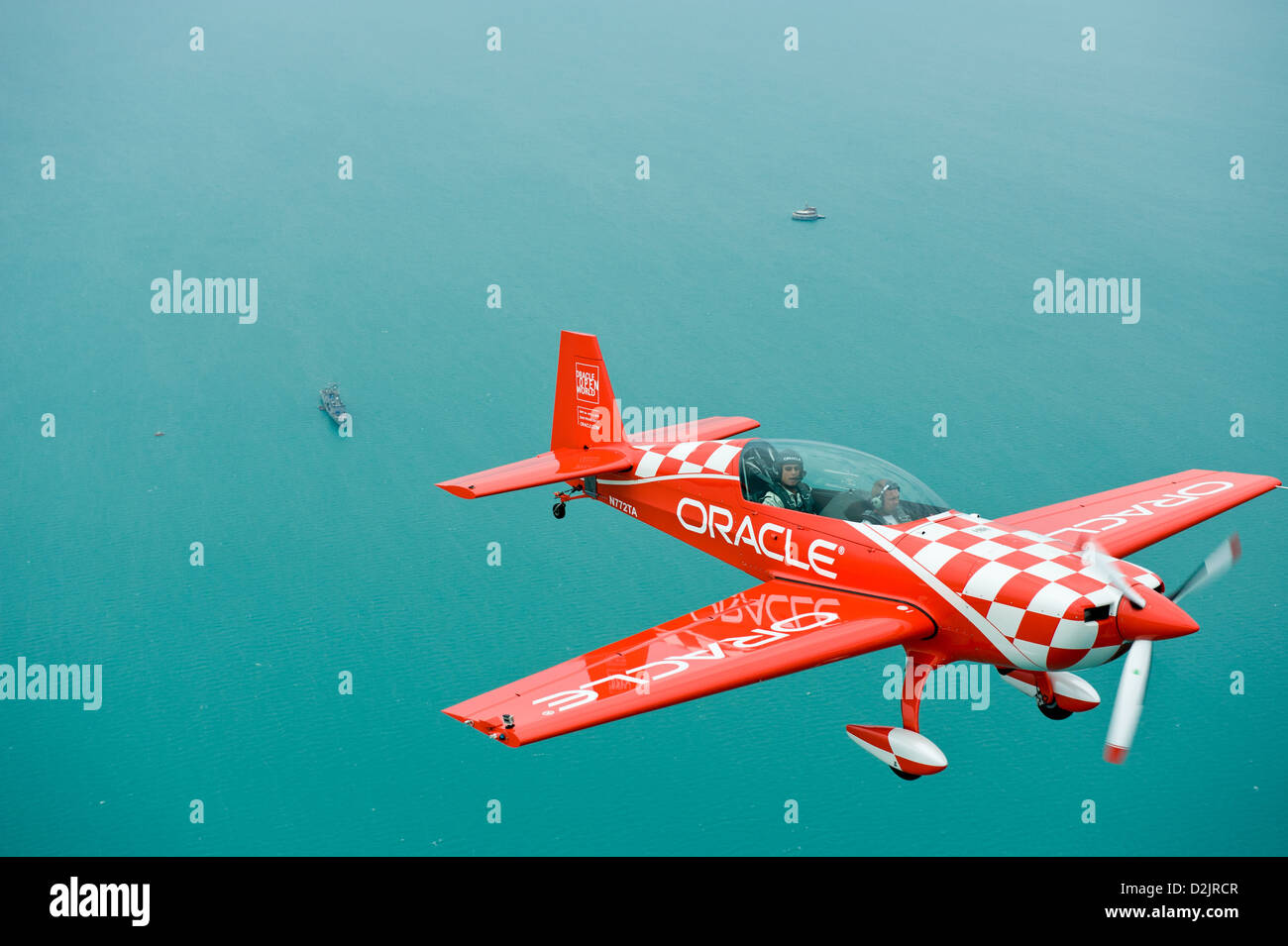 Sean Tucker of Team Oracle flies over Lake Michigan at the Chicago Air & Water Show media preview day. MAX HERMAN/ALAMY Stock Photo
