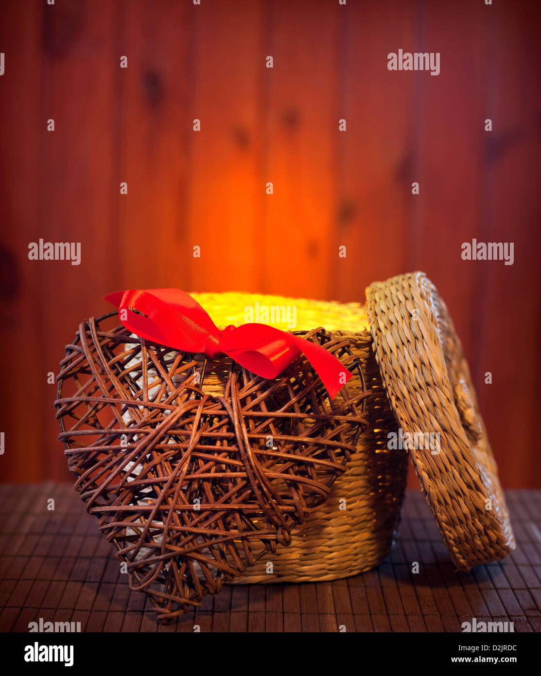 Open empty gift basket box with heart retro background Stock Photo Alamy