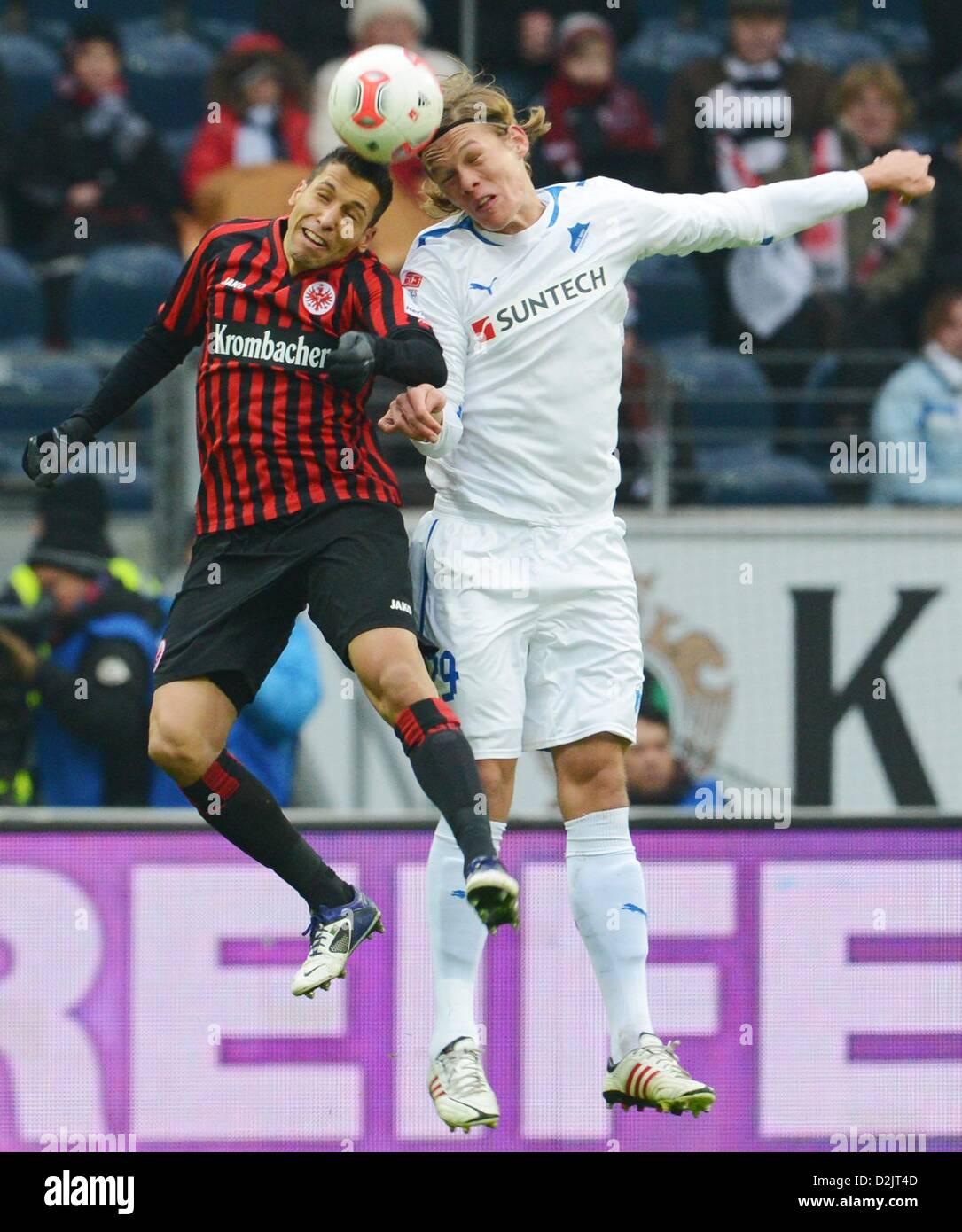 Frankfurt's Karim Matmour (L) vies for the ball with Hoffenheim's Jannik Vestergaard during the Bundelsiga soccer match between Eintracht Frankfurt and 1899 Hoffenheim at Commerzbank Arena in Frankfurt Main, Germany, 26 January 2013. Photo: BORIS ROESSLER (ATTENTION: EMBARGO CONDITIONS! The DFL permits the further utilisation of up to 15 pictures only (no sequntial pictures or video-similar series of pictures allowed) via the internet and online media during the match (including halftime), taken from inside the stadium and/or prior to the start of the match. The DFL permits the unrestricted tr Stock Photo