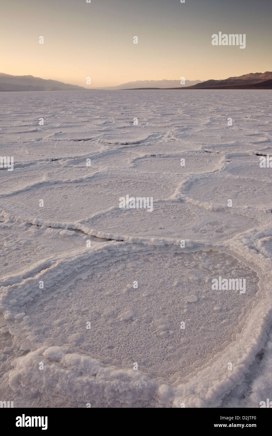 Salt pan polygons below the Black Mountains at Badwater, Death Valley National Park, California. Stock Photo
