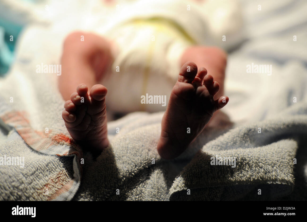 Berlin, Germany, the small feet of a newborn Stock Photo