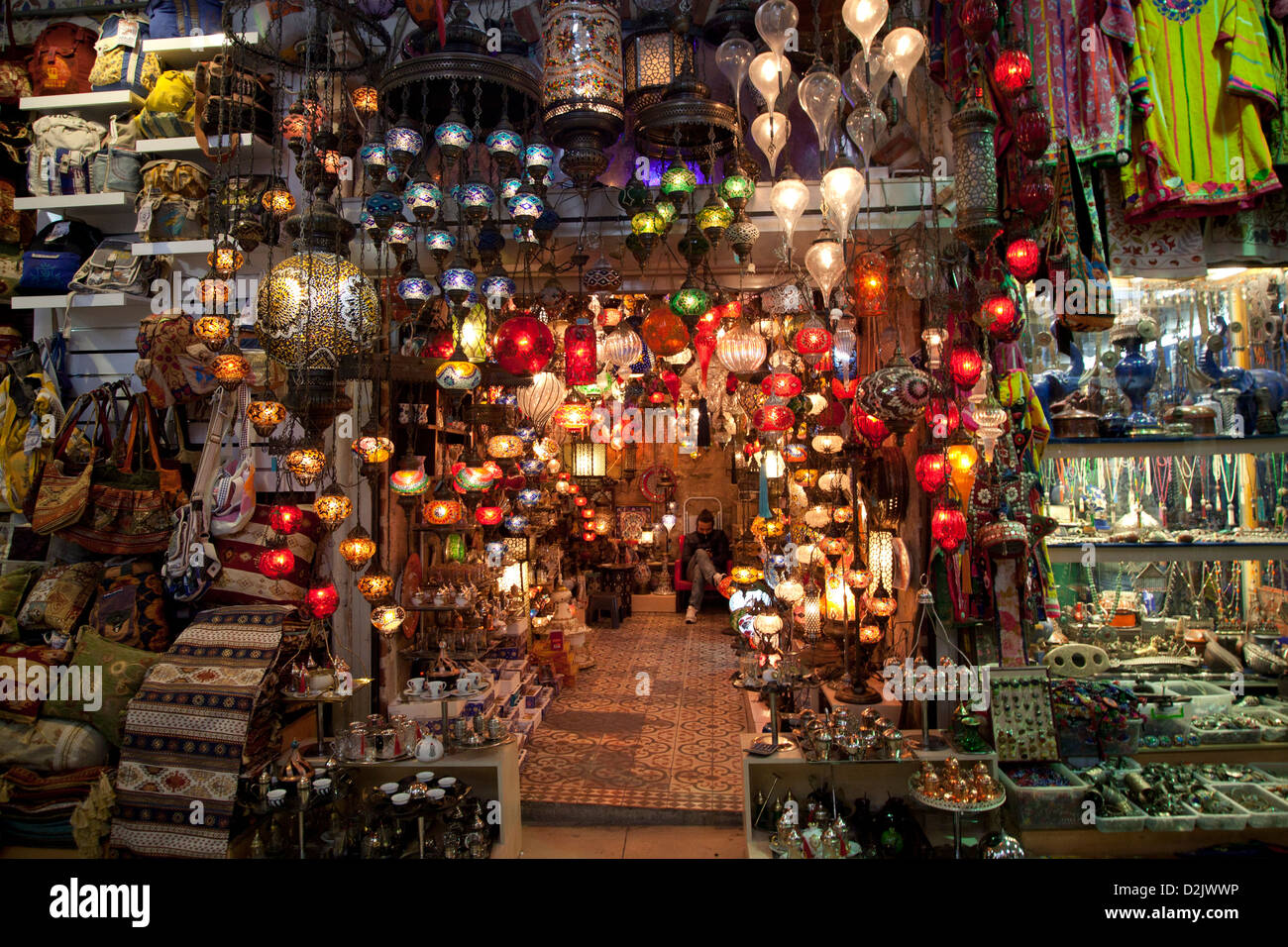 ISTANBUL TURKEY - Hanging colorful electric turkish glass lanterns lamps in a shop of Grand Bazaar Kapali Carsi Kapalicarsi Stock Photo