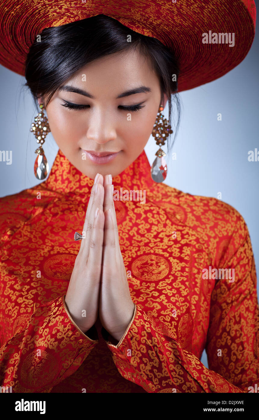 Young vietnamese woman in traditional clothing portrait. Stock Photo