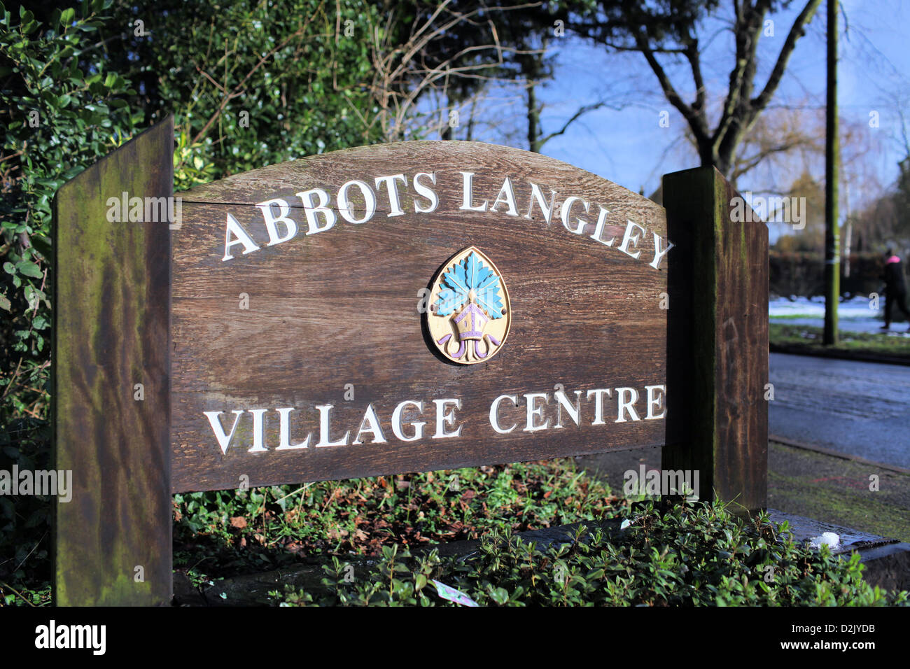 Wooden sign on Abbots Langley High Street for the village centre Stock