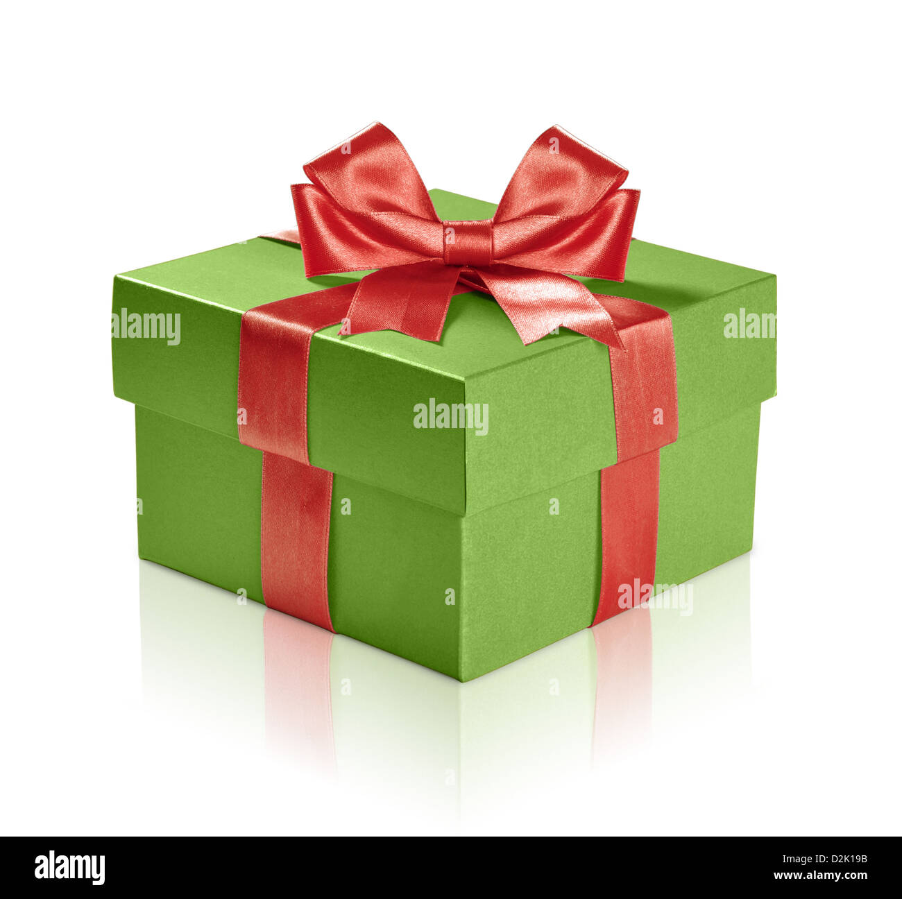 Green gift box with red ribbon over white background. Clipping path included. Stock Photo