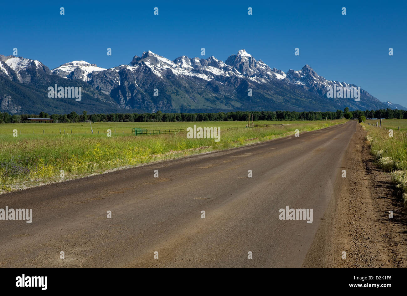WY00232-00...WYOMING - Spring Gulch Road in Jackson with the Teton Range in the background. Stock Photo