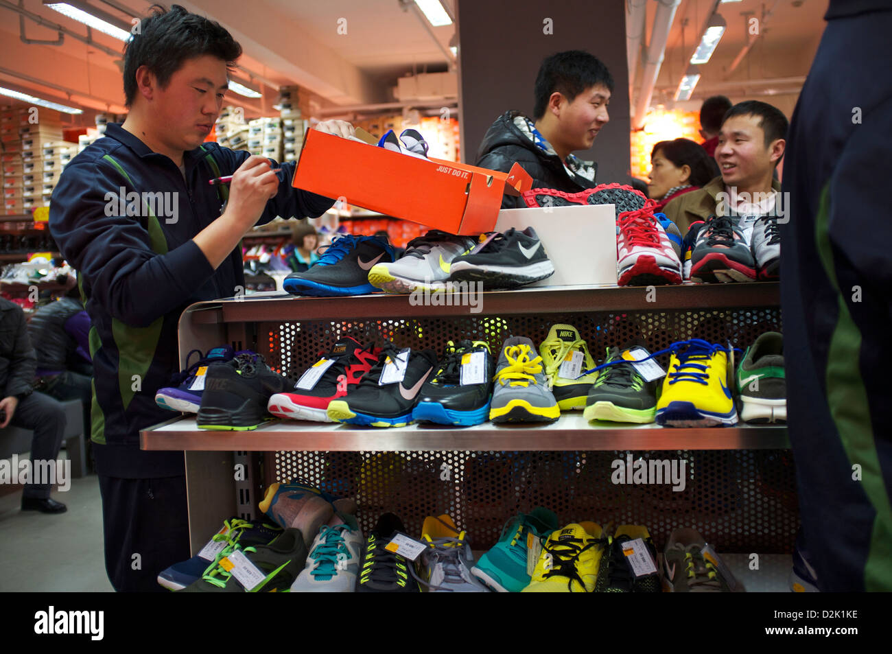 Chinese customers browse a Nike store in Beijing, China. 26-Jan-2013 Stock  Photo - Alamy