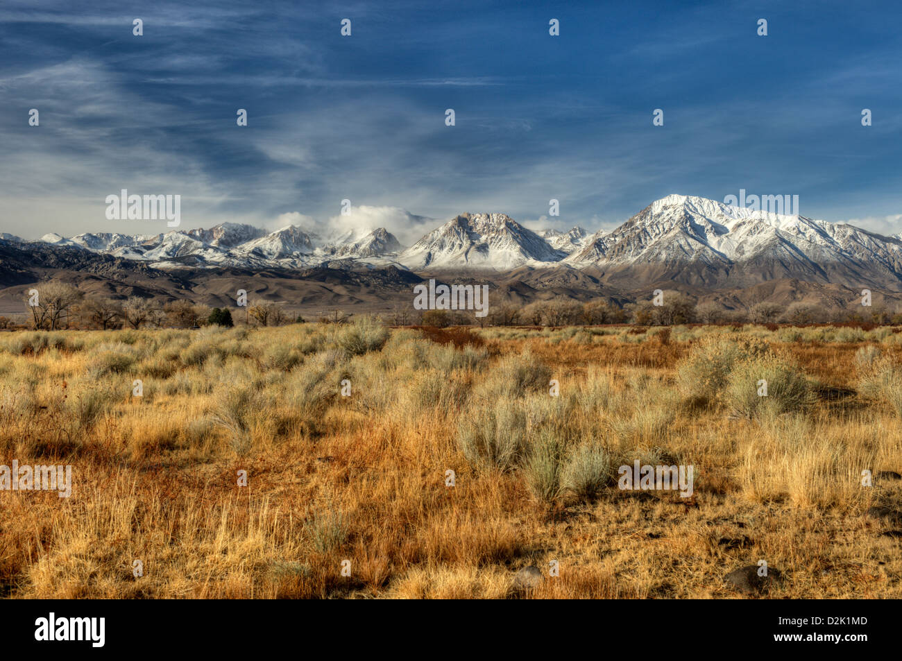 Mount Tom dominates this line of Thirteeners in the eastern Sierra Nevada in the skyline of Bishop, California Stock Photo
