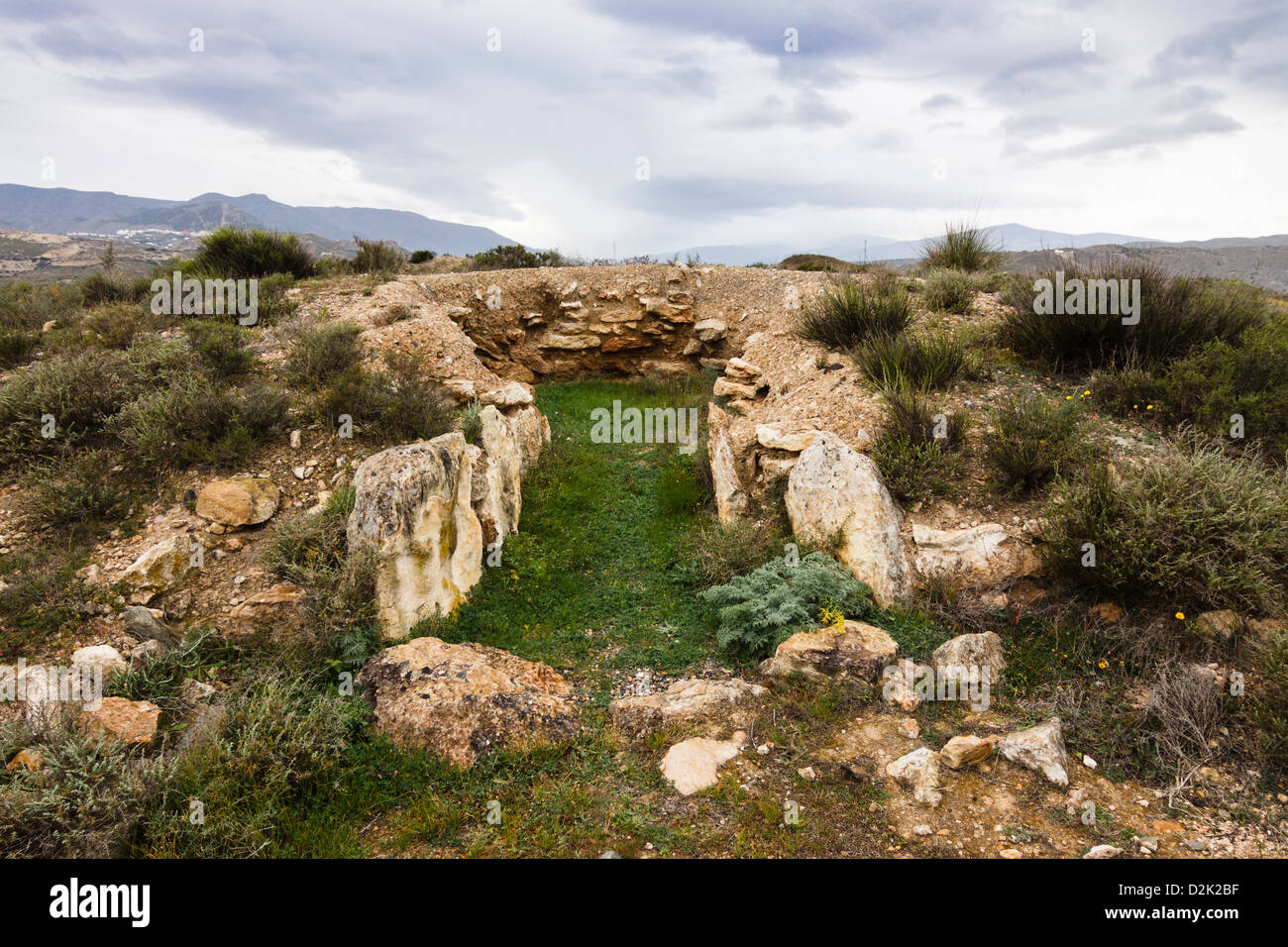 Remains of a tholos passage grave at Los Millares. Copper Age archaeological site. Almeria, Spain Stock Photo