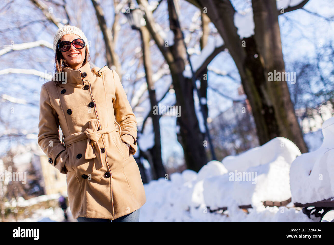 Young woman in the park at winter Stock Photo - Alamy