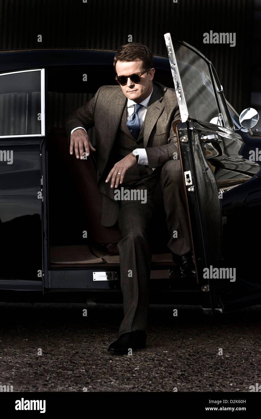 Chauffeur sits Bentley R Type Continental car Stock Photo