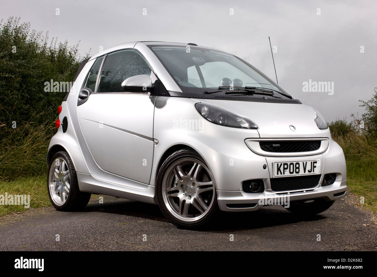 Silver Brabus Smart parked on country road Stock Photo