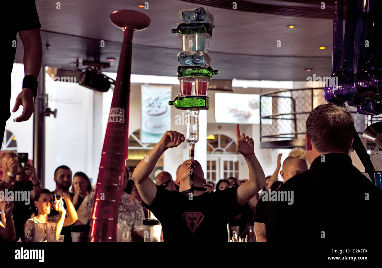 bartender Tim “Flippy” Morris at Carnaval Court Bar & Grill, las vegas,  carries stack of bottles on his forehead Stock Photo - Alamy