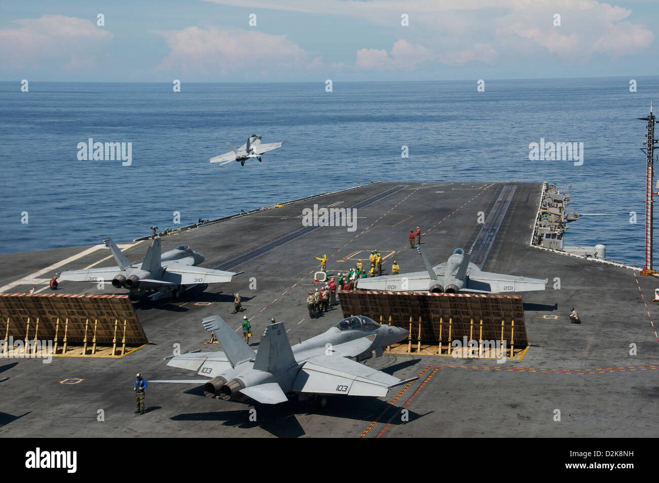 An F/A-18E Super Hornet takes off from the USS George Washington in the Andaman Sea October 12, 2012. Stock Photo
