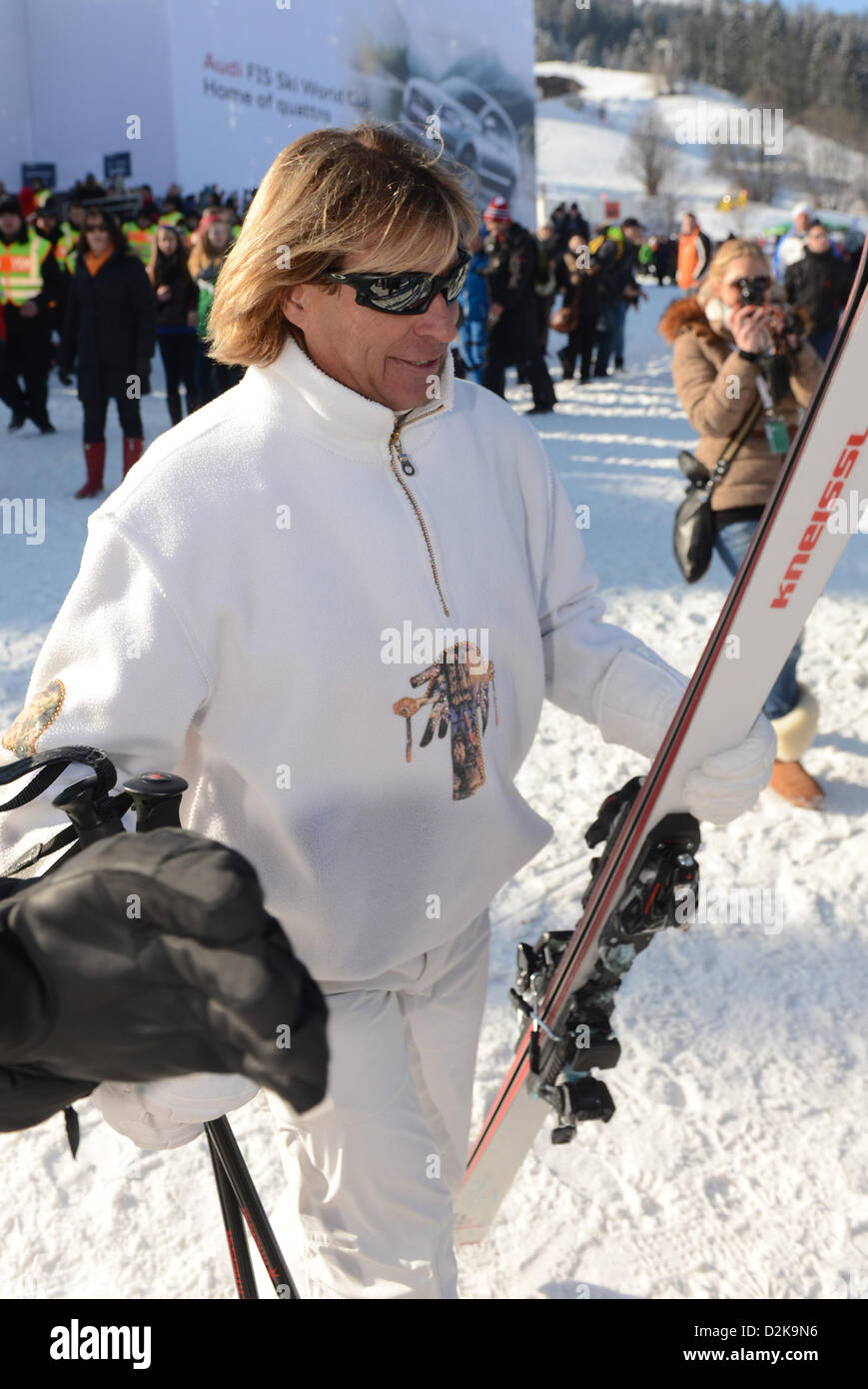 Singer Hansi Hinterseer walks through the spectator's area at the legendary Hahnenkamm Race in Kitzbuehel, Austria, 26 January 2013. This weekend celebrities are coming together in the ski metropolis. Photo: FELIX HOERHAGER Stock Photo