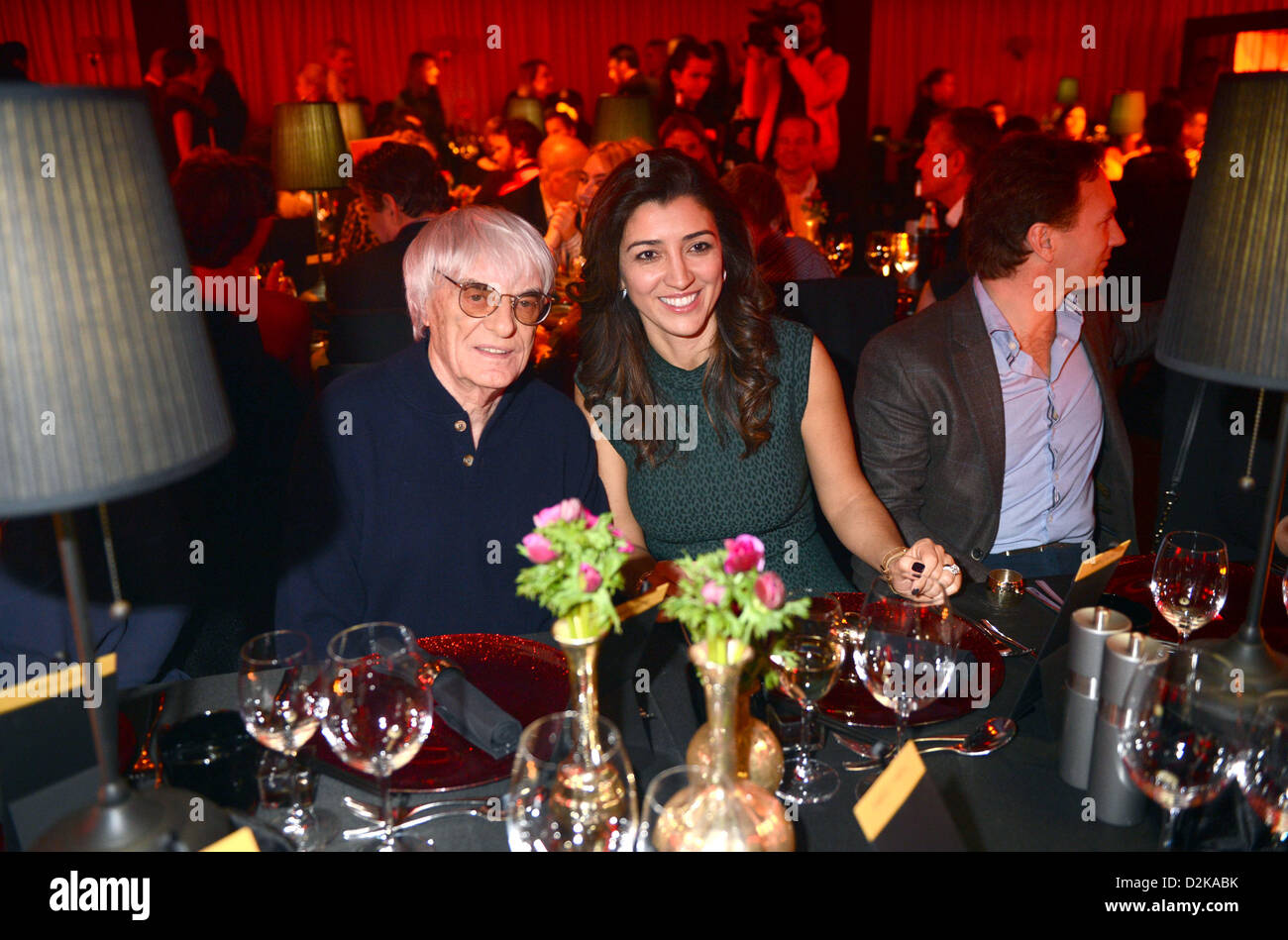 Formula One boss Bernie Ecclestone (L) and his wife Fabiana Flosi celebrate at the Kitz Race Party after Hahnenkamm Race in Kitzbuehel, Austria, 26 January 2013. This weekend celebrities are coming together in the ski metropolis. Photo: FELIX HOERHAGER Stock Photo