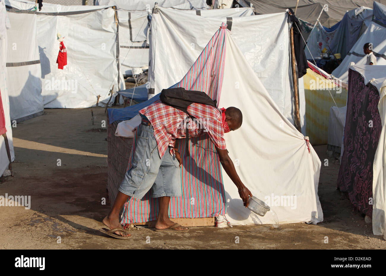 Carrefour, Haiti, earthquake victims in front of his tent in the IDP Camp Stock Photo