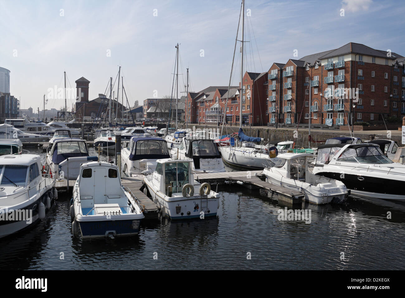 The expanse of Swansea marina in the old town dock, Wales UK Boats moored Swansea waterfront quayside Stock Photo