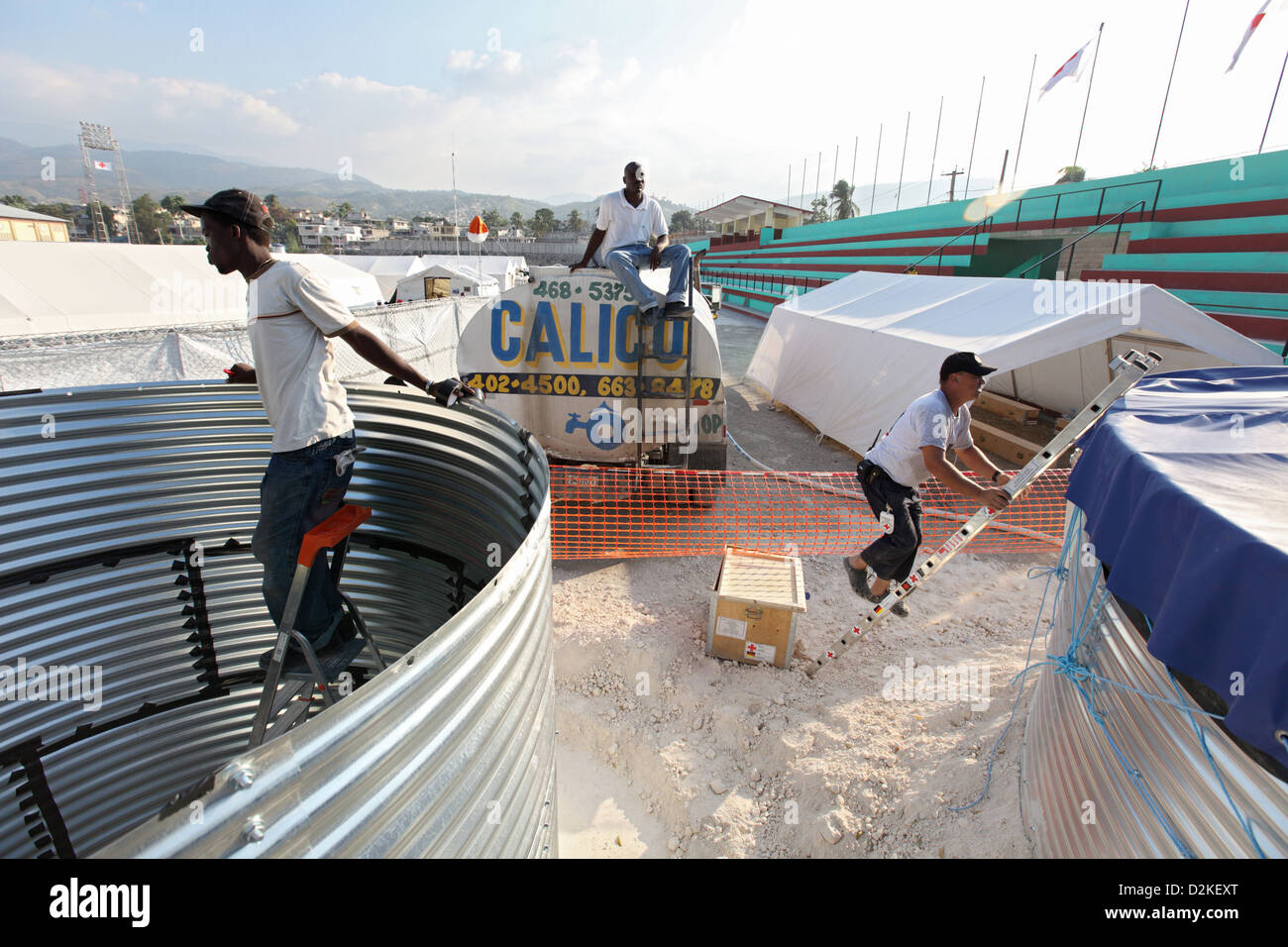 Carrefour, Haiti, volunteers build water tanks for drinking water supply Stock Photo