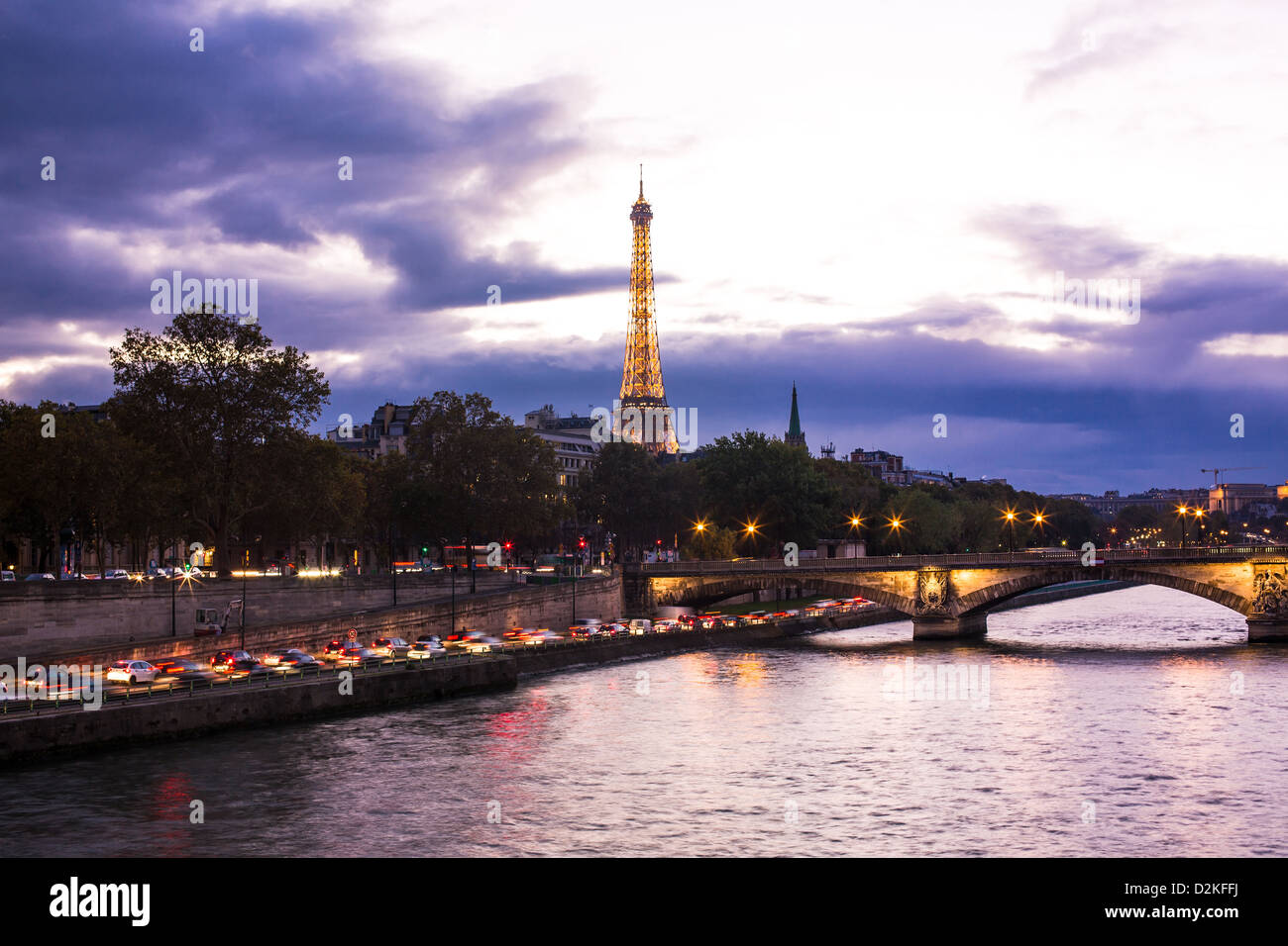 Night view on Eiffel tower from Alexander III bridge in Paris Stock Photo