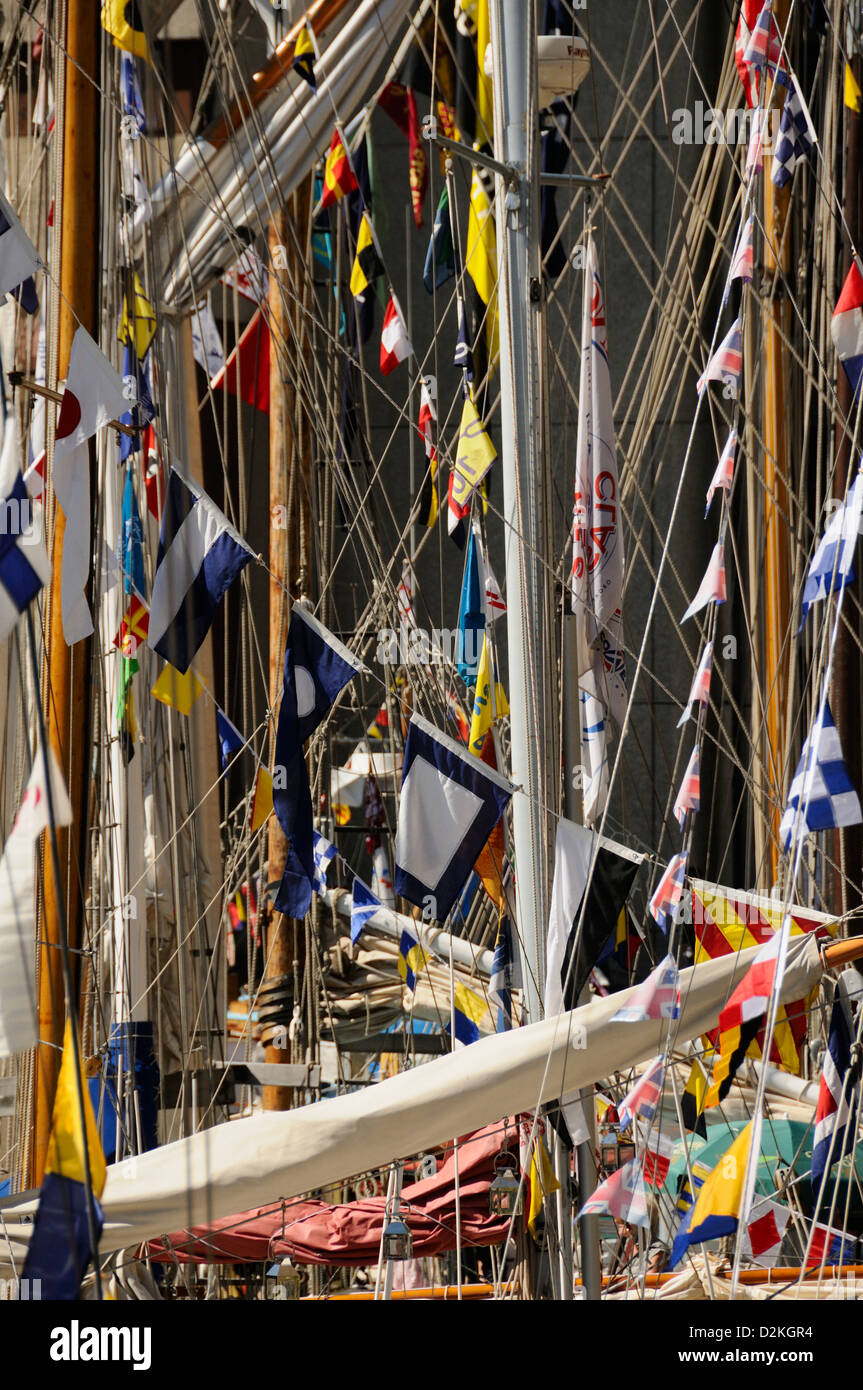 Boats, masts, ropes and flags at St Katherine's Dock, London Stock ...