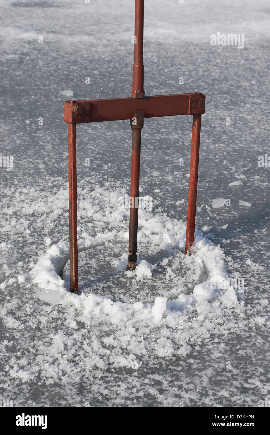 Ice Boring Ice cutting lake hi-res stock photography and images - Alamy