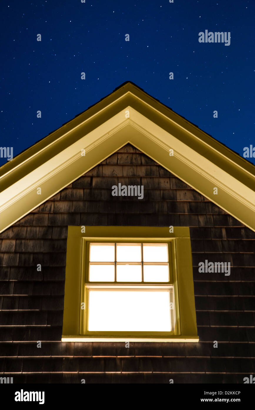 Cottage window on a starry night. Stock Photo
