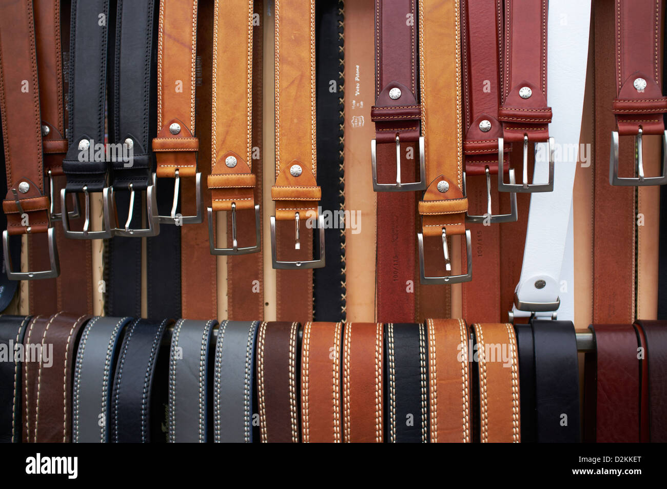 Leather belts for sale to tourists in limone Stock Photo