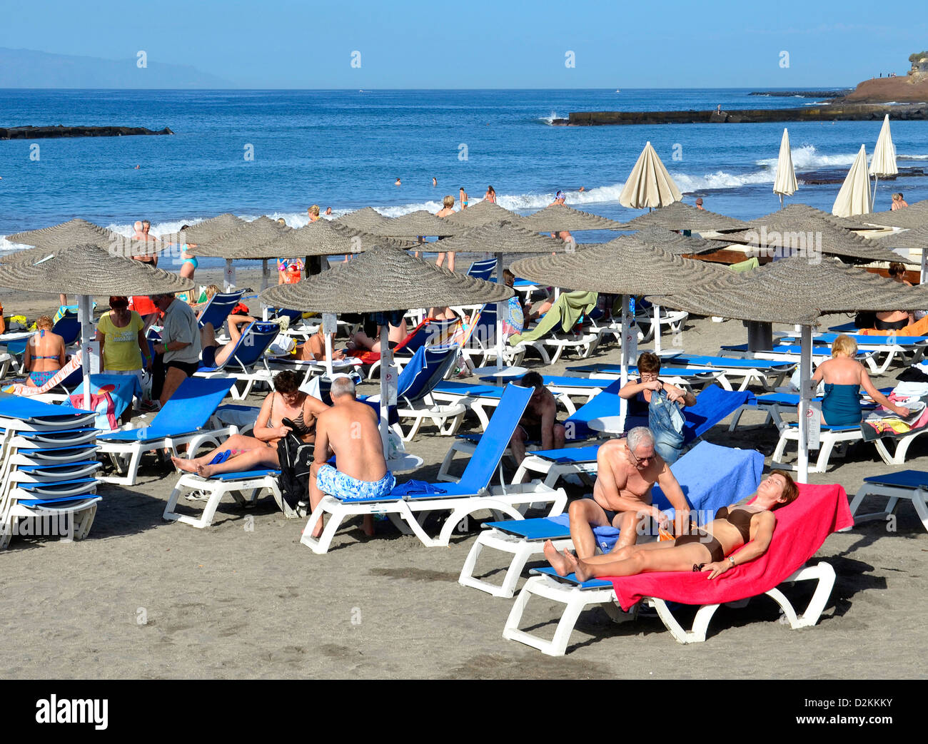 retired holidaymakers on a beach in tenerife, canary islands Stock Photo