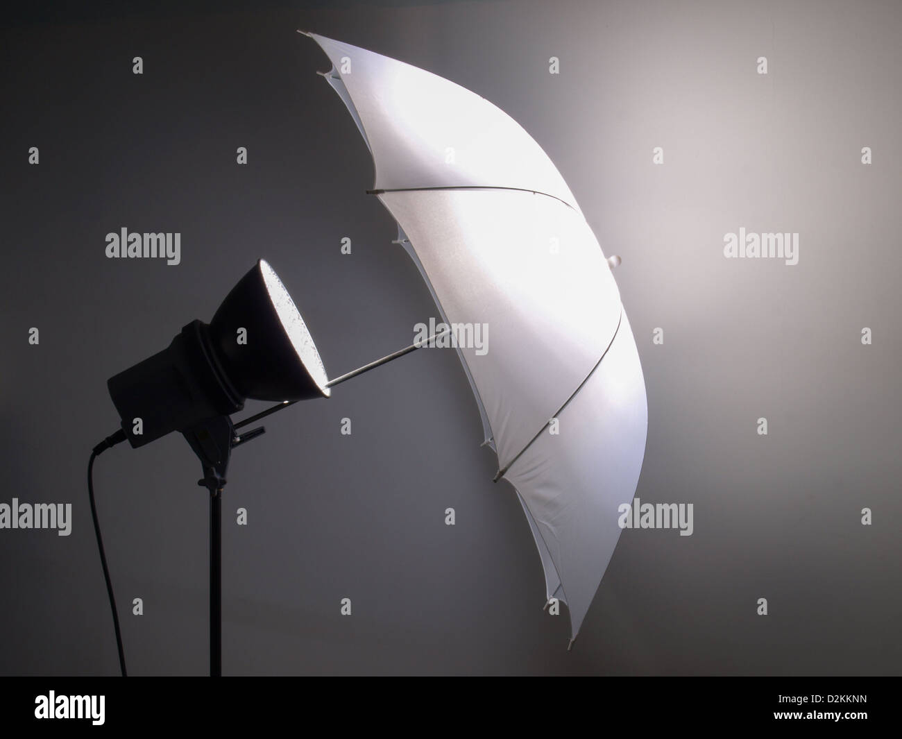 Light umbrella reflector used in photographic studio Stock Photo