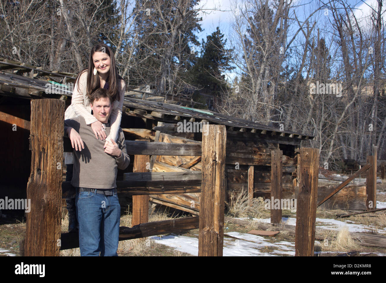 a young couple in love by an old barn Stock Photo - Alamy