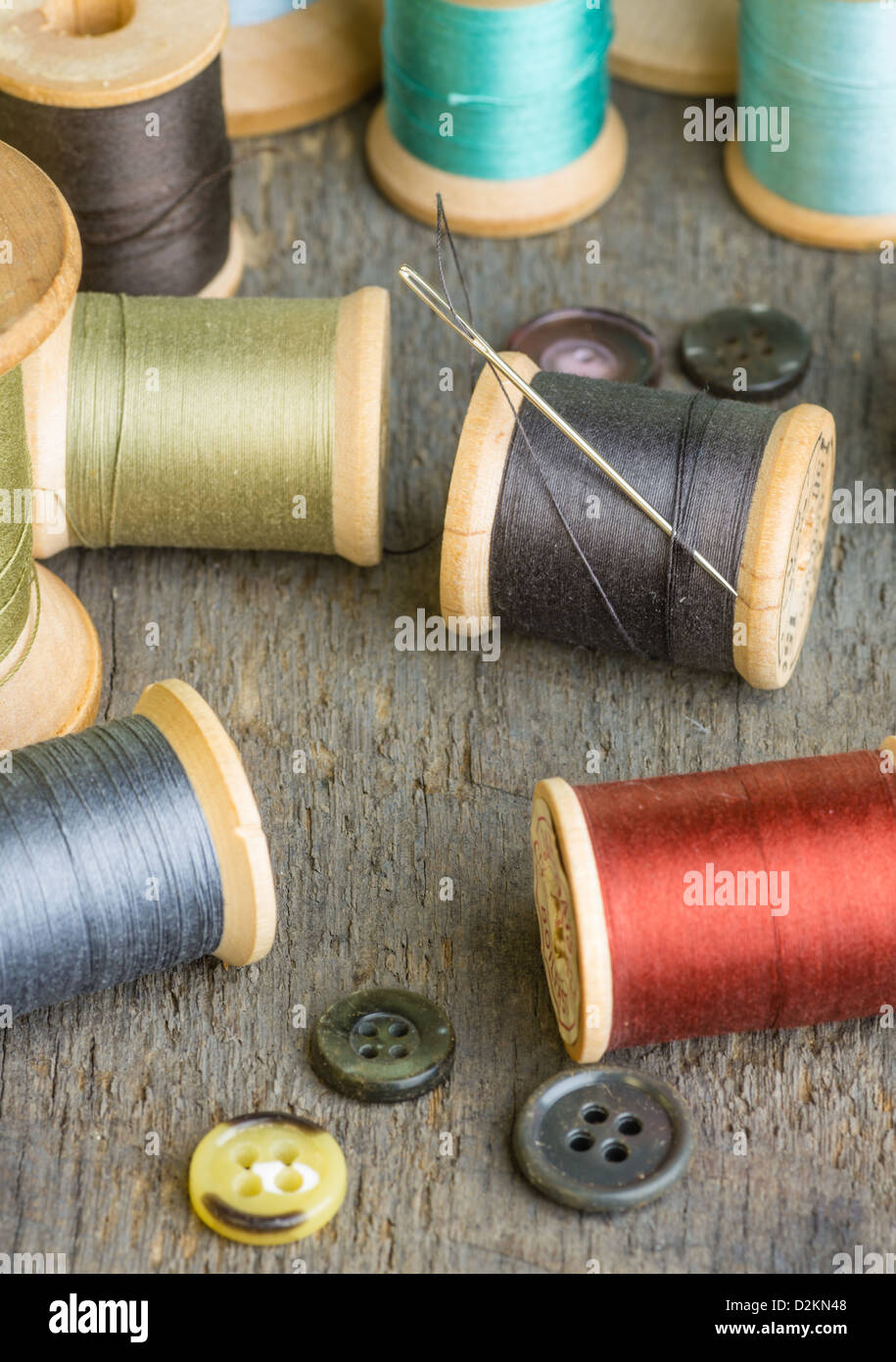 Needle and thread and buttons hi-res stock photography and images - Alamy