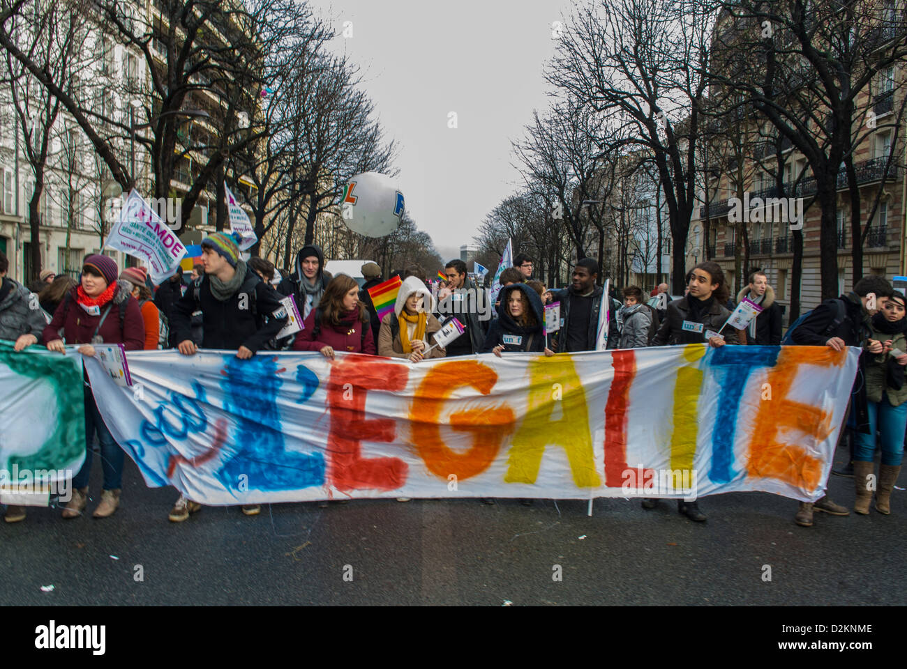 Paris, France, French lgbt samesex Activists N.G.O. Groups Marching at pro Gay Marriage Demonstration, Holding Banner on Street 'Equality ' Rainbow, young lesbians and gay men Stock Photo