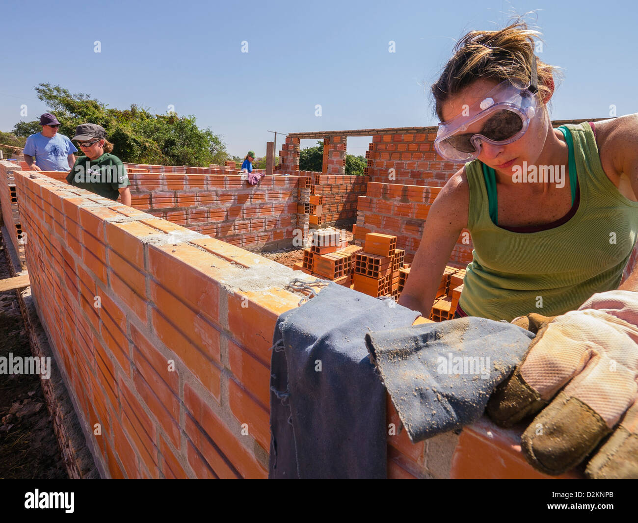 A volunteer from the United States works on a Habitat for Humanity site in Luque, Paraguay. Stock Photo