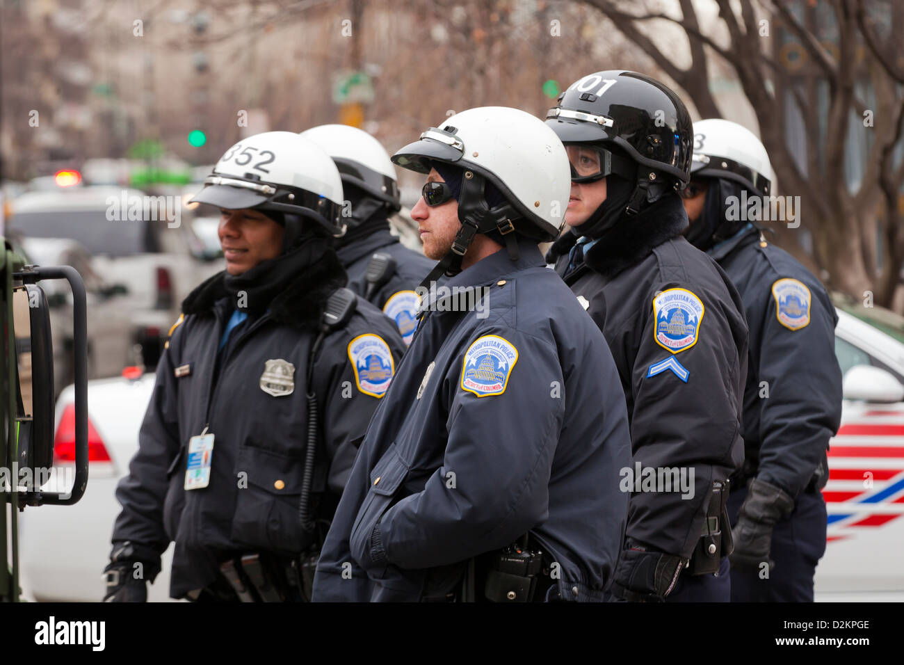 Crowd control policemen in helmets Stock Photo