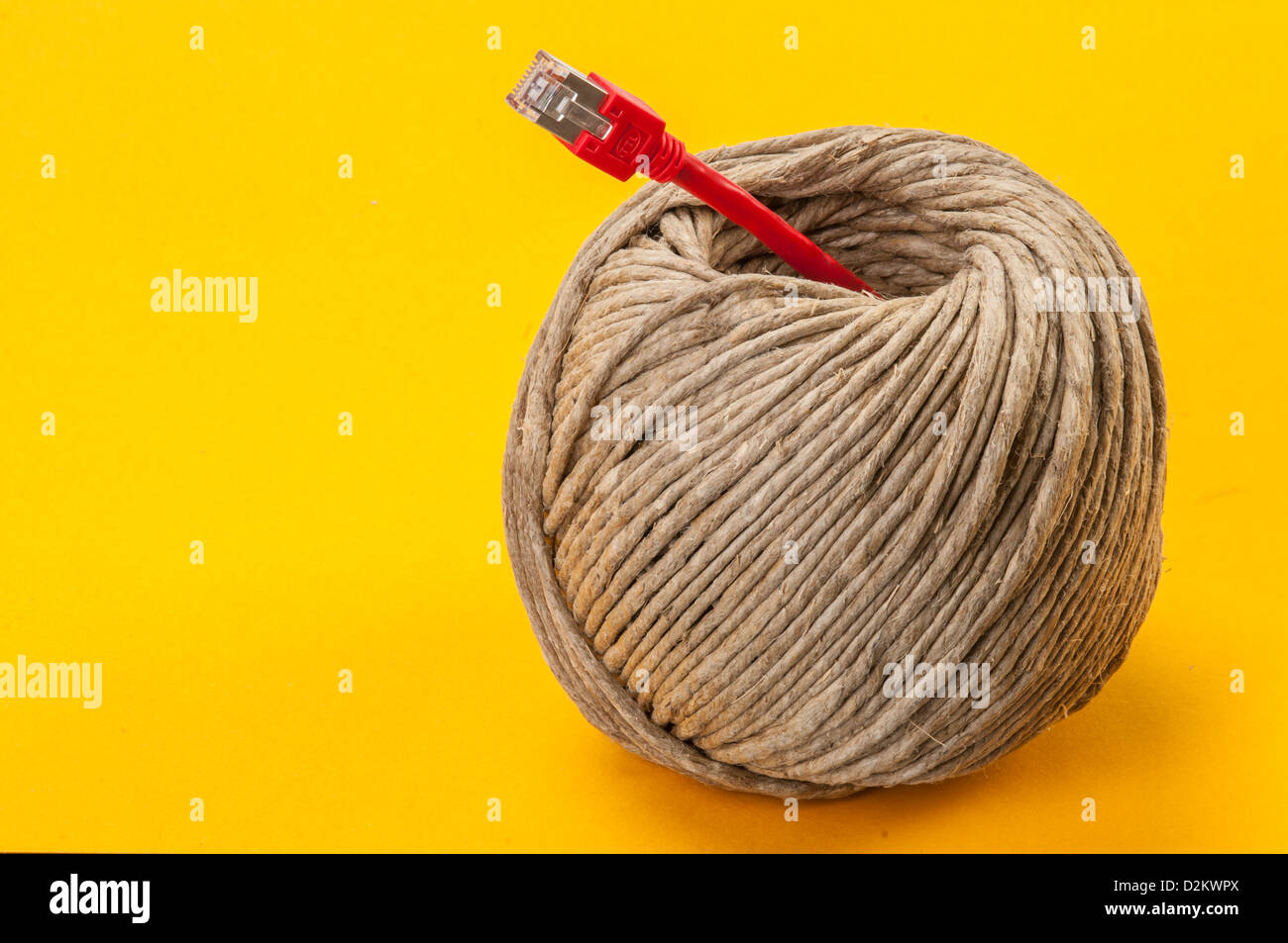 A roll of twine and ethernet cable Stock Photo