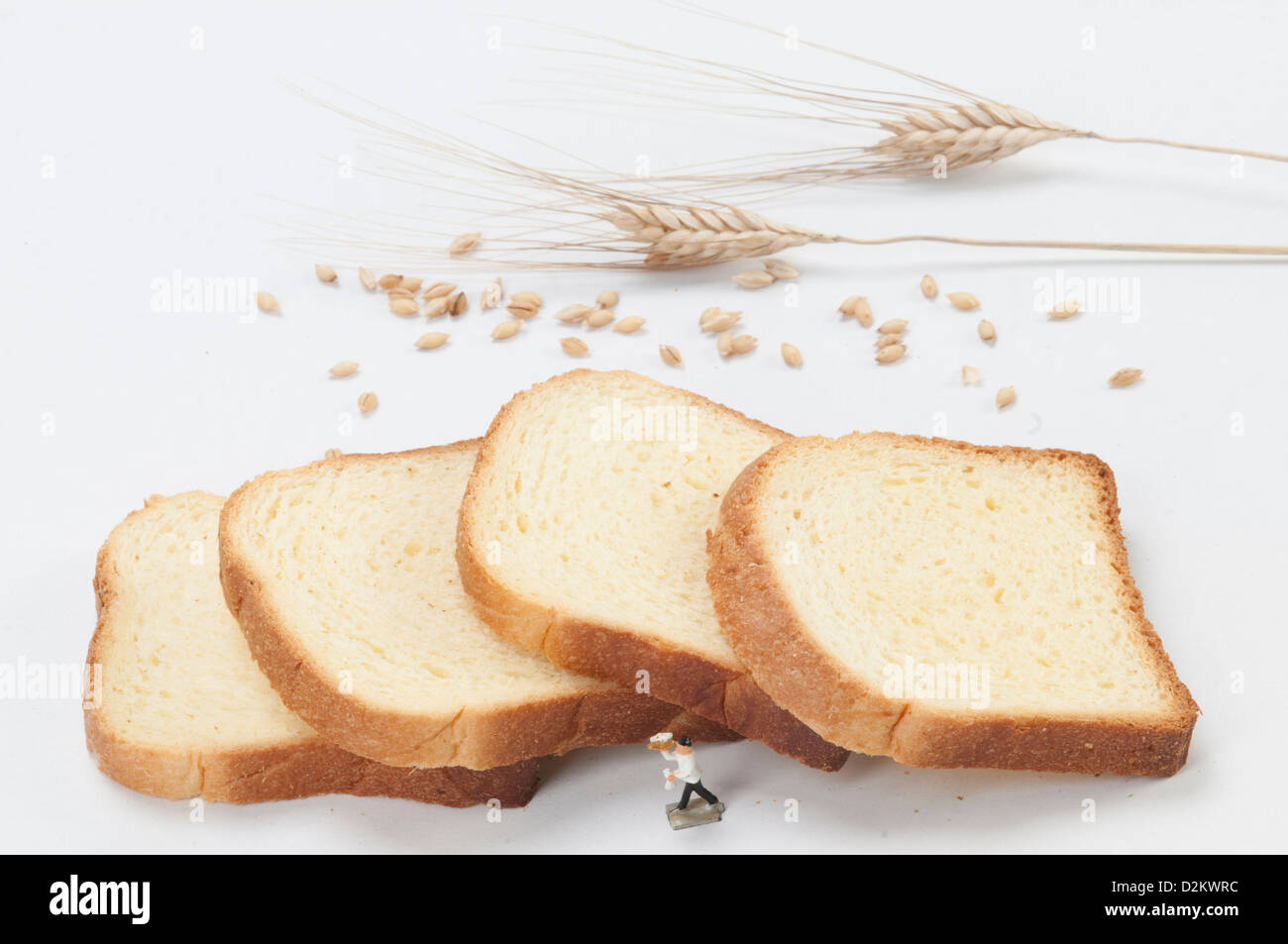 Ears of wheat and slices of bread Stock Photo