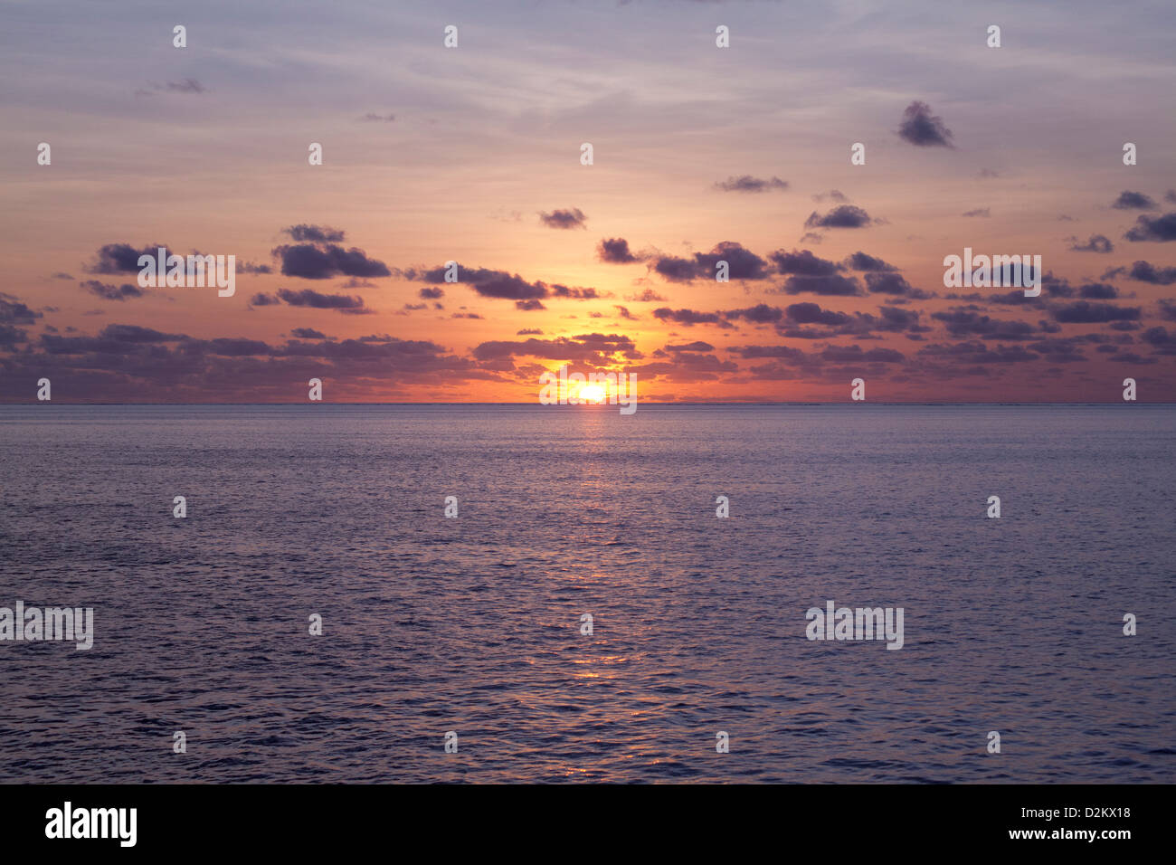 Sunset on the sea at the Great Barrier Reef, Australia Stock Photo