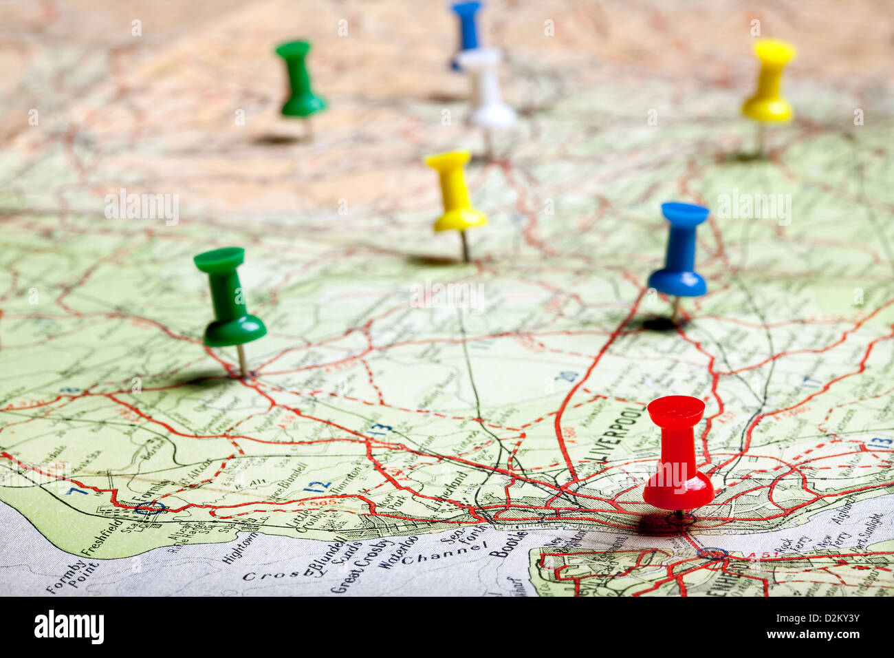 Several pushpins on a road-map of a tourist Stock Photo - Alamy