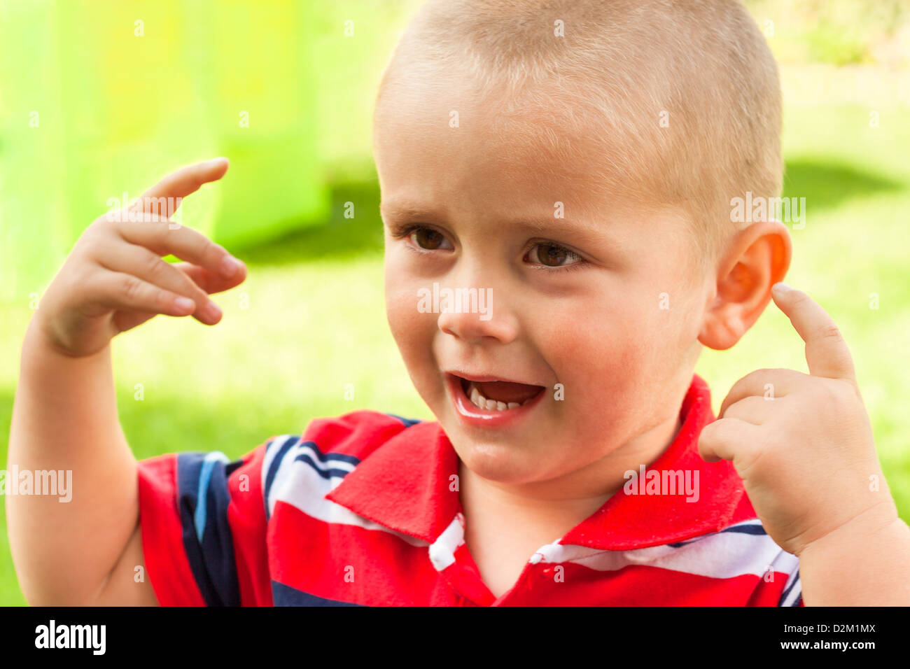 Close up of loud child boy shouting and gesturing. Stock Photo