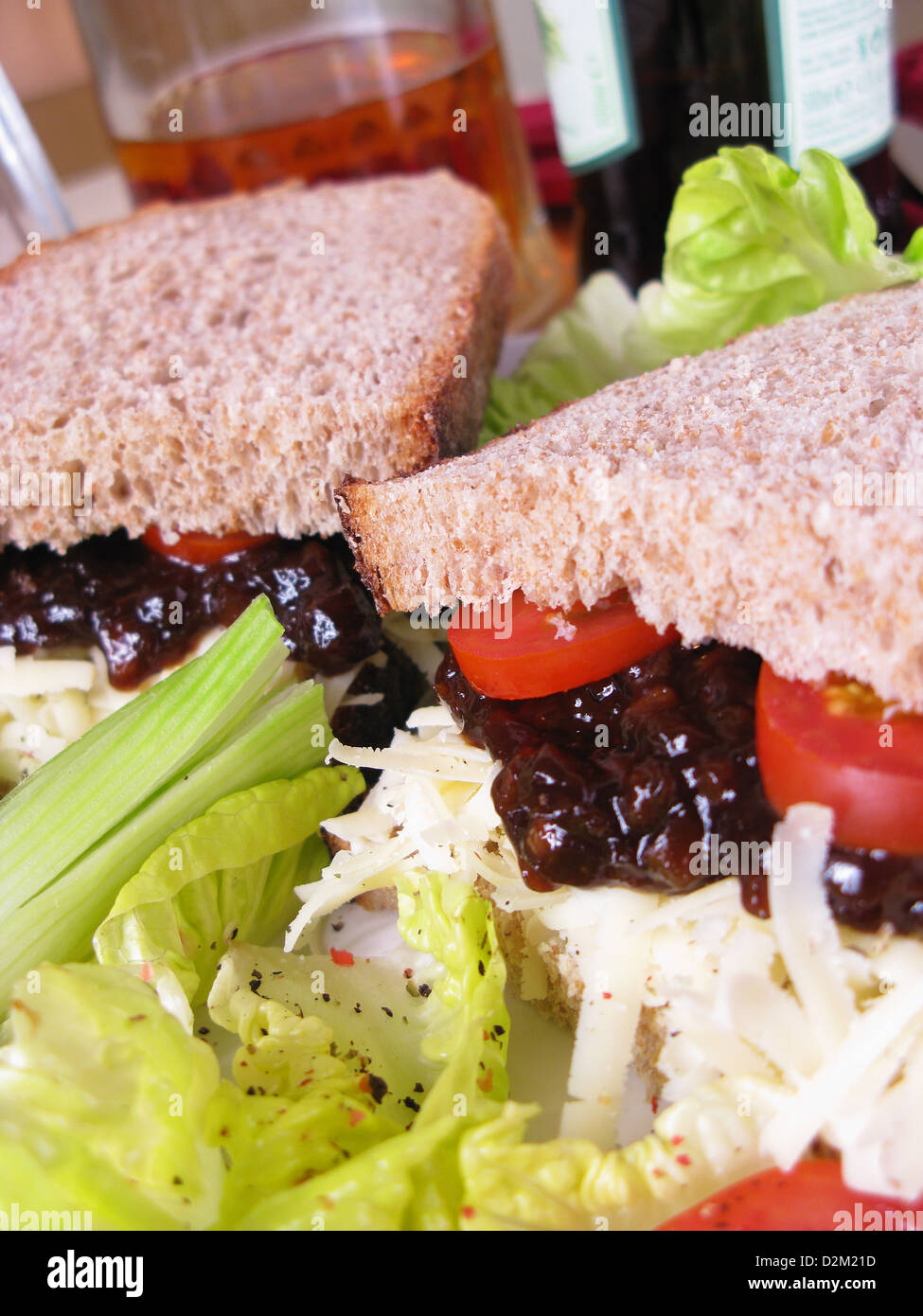 A ploughman's lunch sandwich, made with grated vintage Cheddar cheese