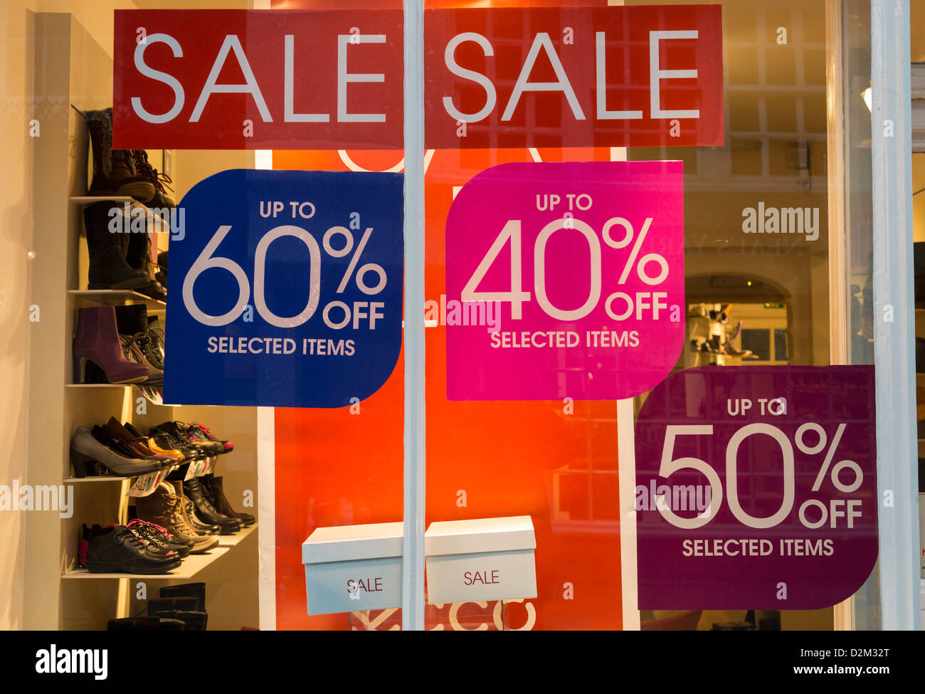 Shop window with percentage price reductions Stock Photo Alamy