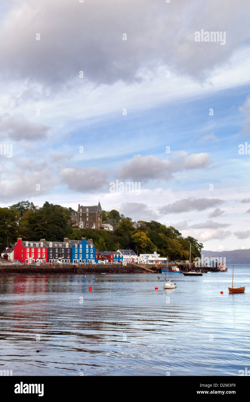 Sea front and harbourside of Tobermory, Isle of Mull, Scotland taken on a bright cloudy day Stock Photo