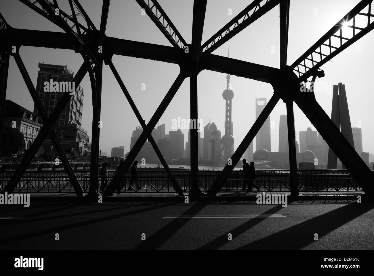 Shanghai City historical Waibaidu Steel Bridge surrounded by highrise building located along Huangpu River. China. Stock Photo