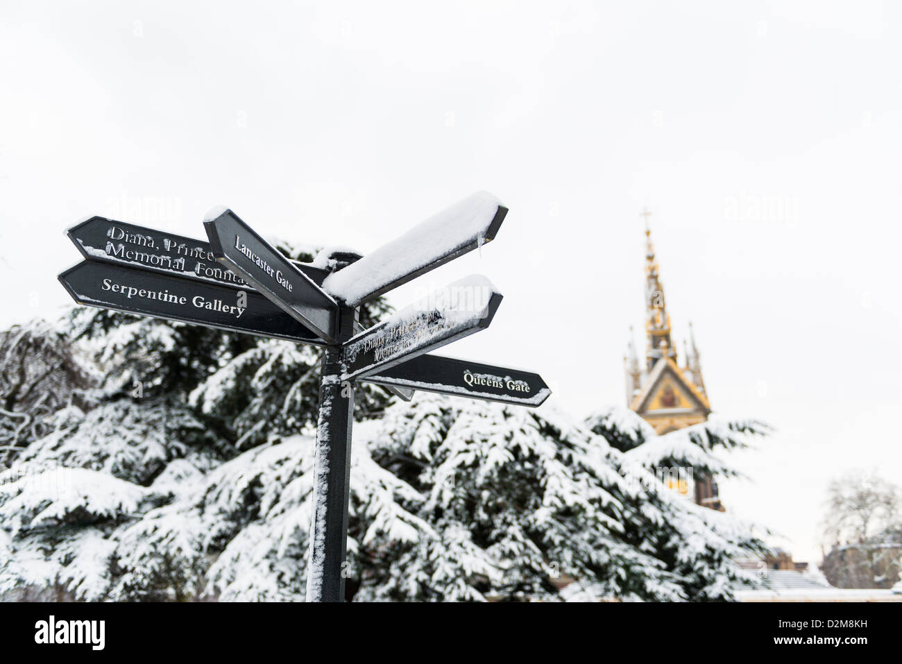 Directions sign in Hyde Park, with Albert Memorial in the background after three days of