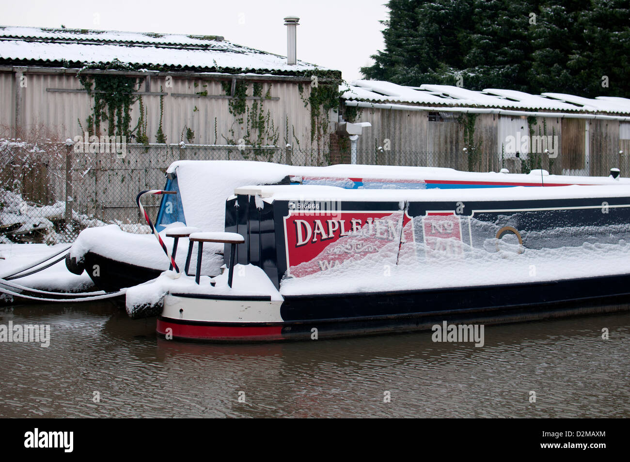 Narrowboats on Grand Union Canal in winter Stock Photo