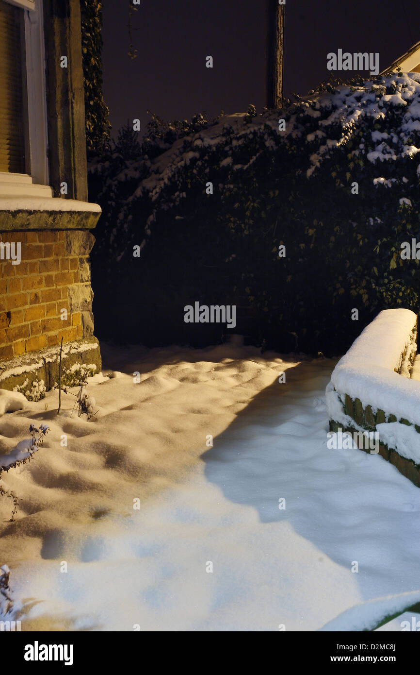 snow covered garden in front of house. Worksop,Notts, England, UK Stock Photo