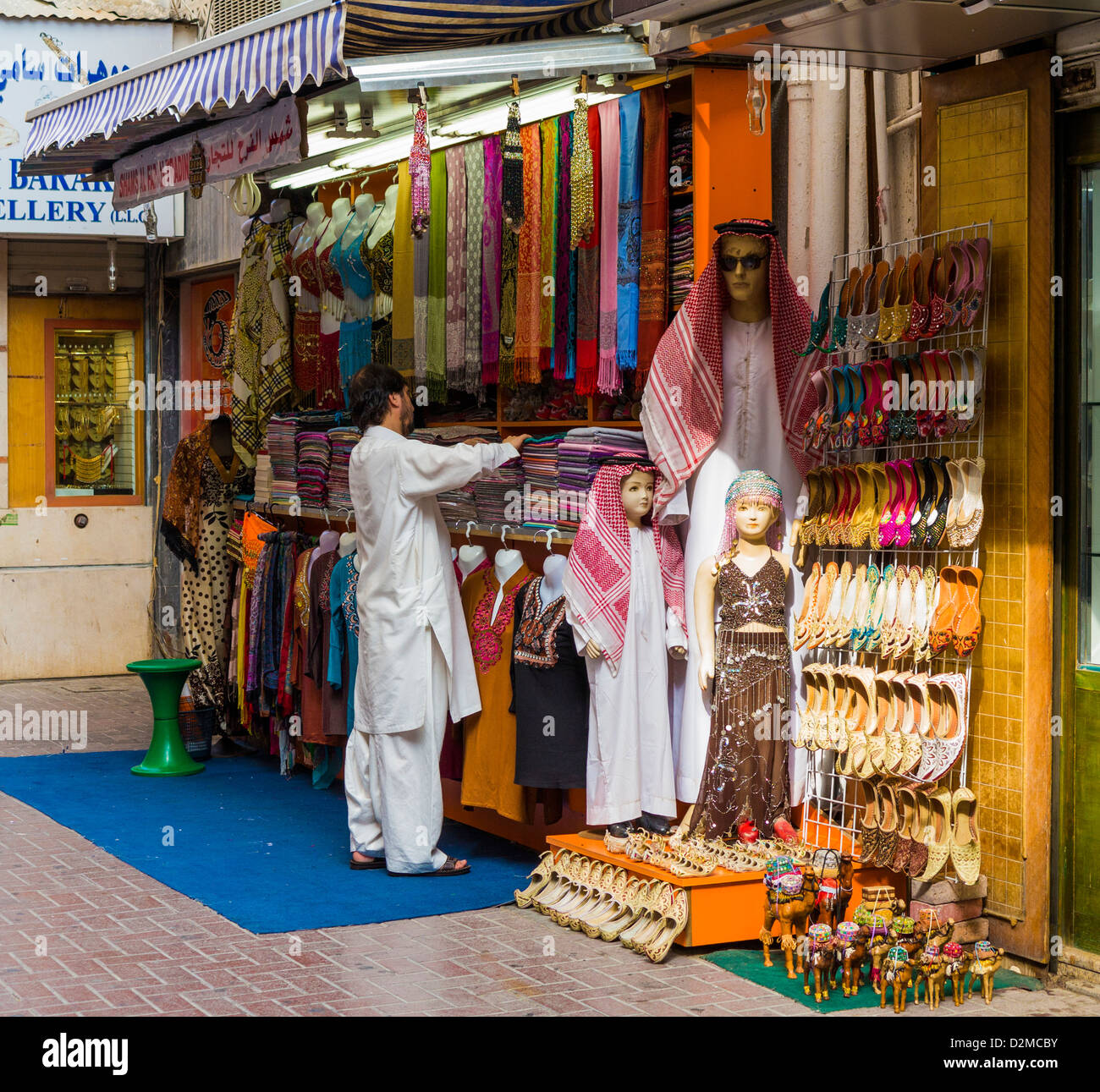 A traditional clothing stall in a Dubai Souk Stock Photo