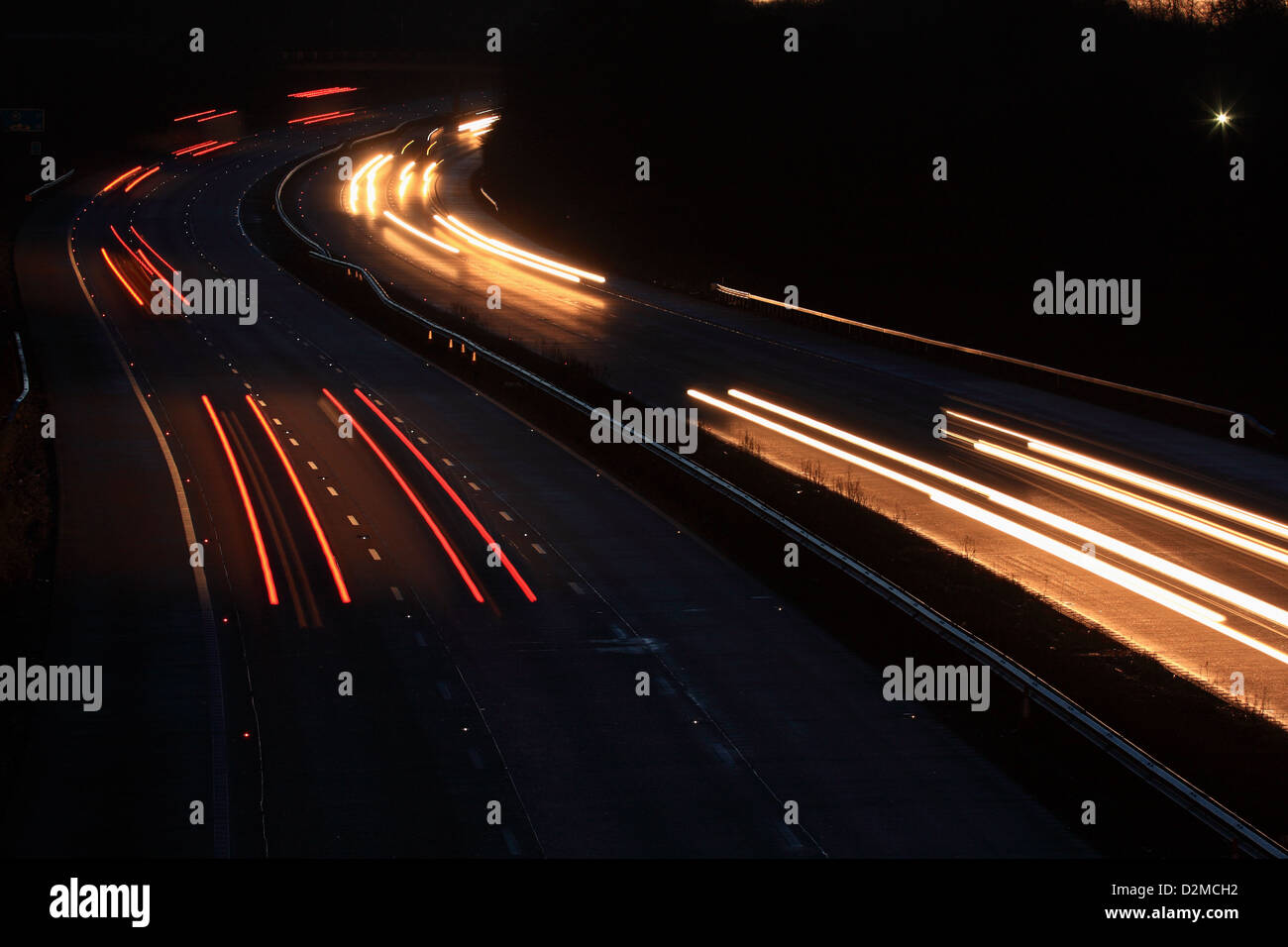 Traffic light trails vehicles traveling hi-res stock photography and ...