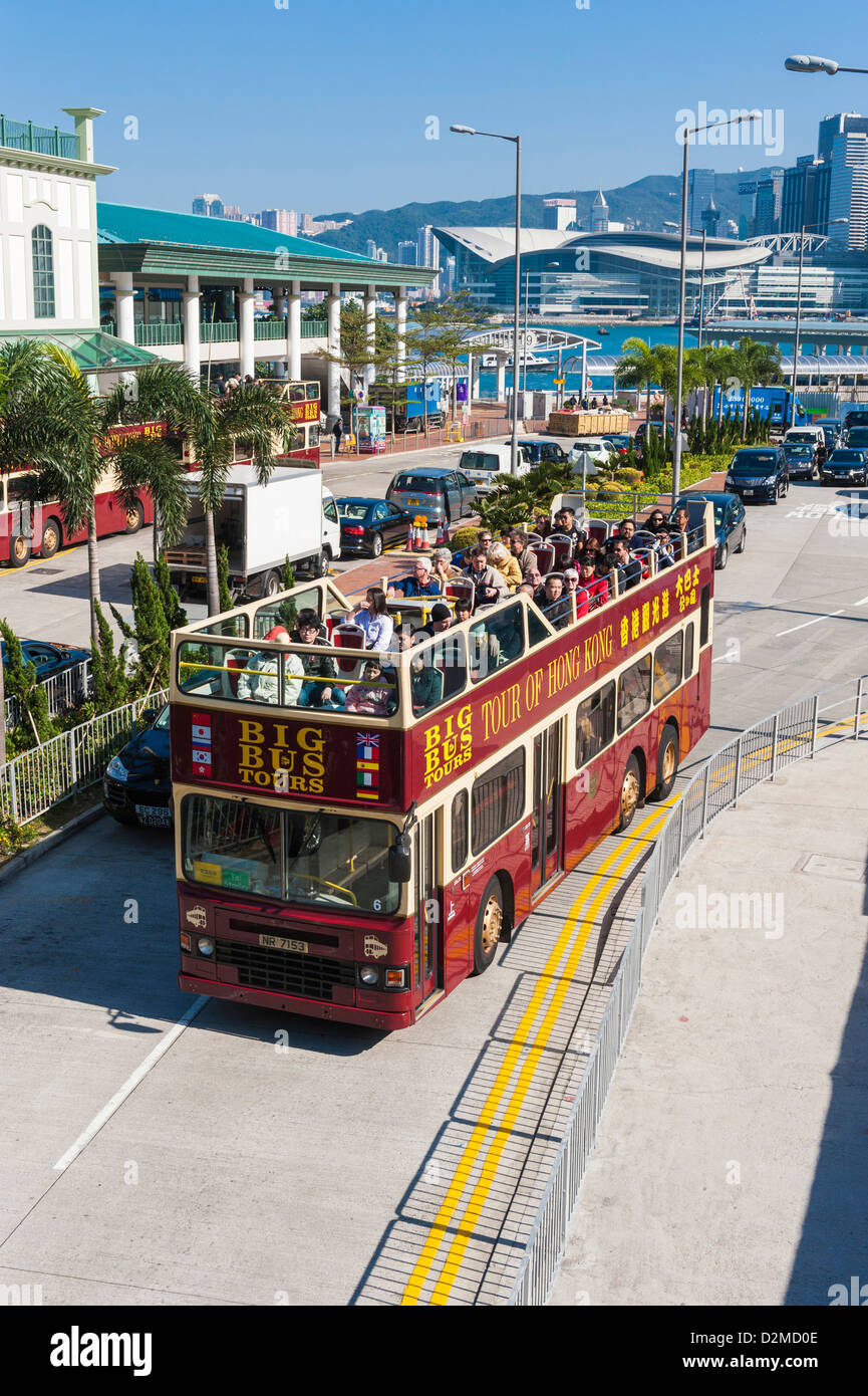 Hong Kong sightseeing bus and tourists in the city centre Stock Photo